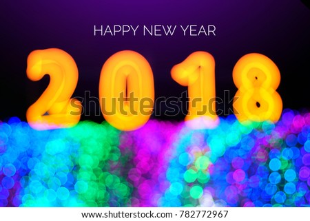 Vibrant bokeh for background. Happy new year 2018 concept.