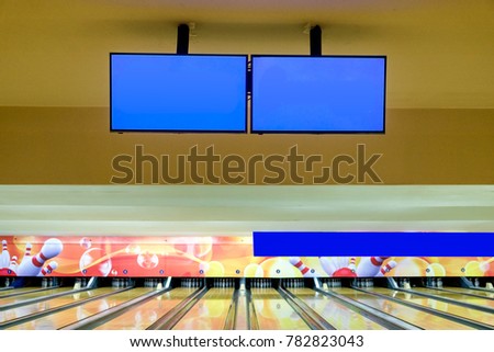 Blank display with sport game bowling pin on wood alley background