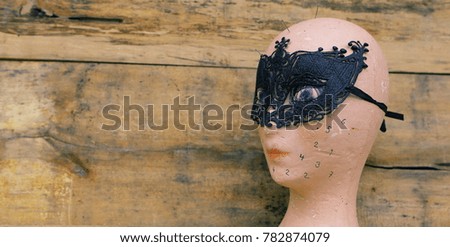 Eye mask. wooden background and copy space