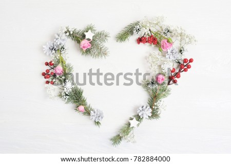 Mockup Christmas heart wreath with spruce, hypsophila, cones and snowflakes in rustic style with place for your text, Flat lay, top view photo mock up