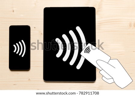 Contactless payment icon on cell phone, tablet and down credit card in hand. Tap to pay concept - vector sign