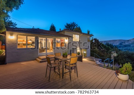 Wooden Deck outdoor patio at night with amazing hillside view an