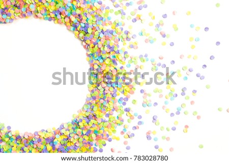 Frame made of colored confetti. 
