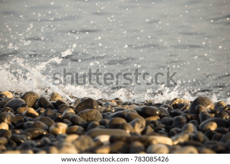 sea pebbles and sea spray on the coast