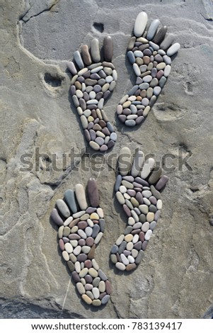 Human footprints in stone