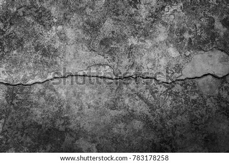 Grungy wall with large crack cement floor texture,cement large crack for dark background Royalty-Free Stock Photo #783178258