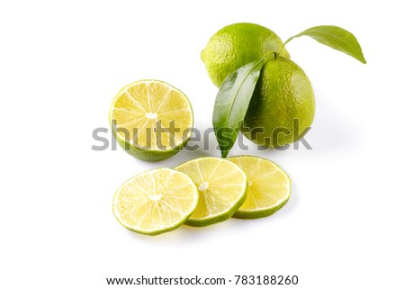 Fresh ripe limes on white background