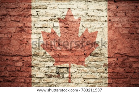 Canada flag on the brick wall texture