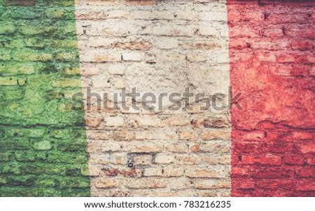Italian flag on the brick wall texture