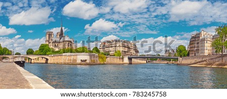 Paris, river Seine with Notre-Dame cathedral from the back on a bright day in Spring