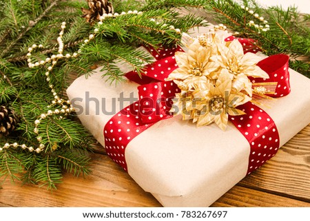 Christmas, New Year background with colored decorations, gift box, greeting card, blank, oranges,  pine cones, nuts.