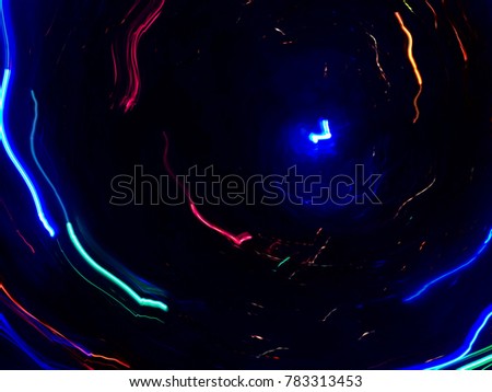 Abstract cosmic background with light flux motion. Swirl cosmos neon glow universe. Natural photography energy long exposure light.