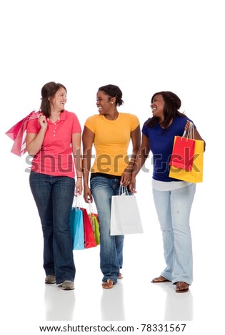 Young college age ladies/friends with shopping bags on white background