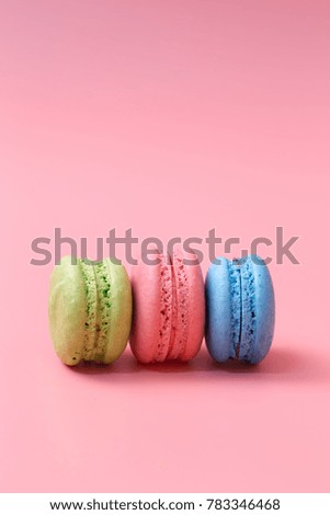 macaroons on pink background.