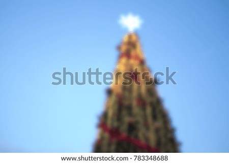 Blur background Christmas tree with blue sky background