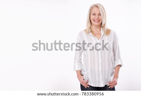 Friendly smiling middle-aged woman isolated on white background. Happy pretty women Royalty-Free Stock Photo #783380956