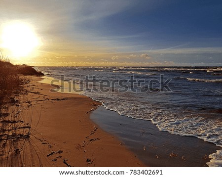 The photo of Latvian sunset near the Baltic sea.