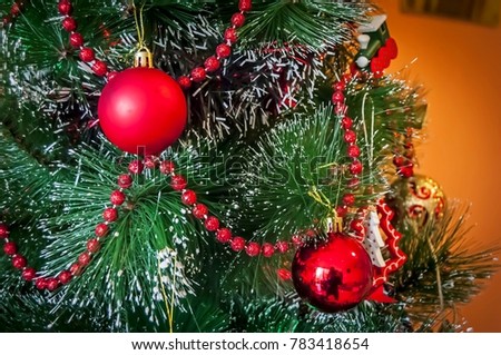 A Christmas tree (or a New Year tree) with beautiful festive decoration ornament. Xmas tree concept. New Year background.