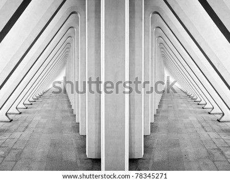 Modern symmetric tunnel in futuristic interior with concrete arches in perspective
