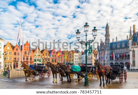 Grote Markt square in medieval city Brugge, Belgium. Royalty-Free Stock Photo #783457711