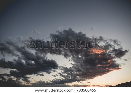 Sky Background with dranatic clouds, at sunset