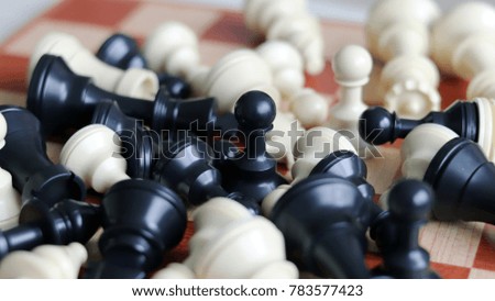 Chess game, chess pieces with wood chessboard.