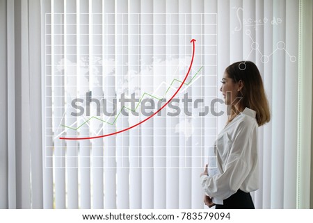 business woman stand near office window with world map and financial profit chart success growing up from brain vision marketing and mathematics design business strategy in global network invest.