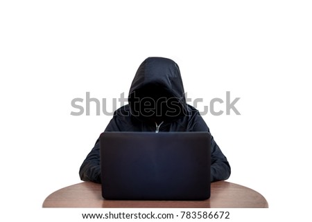 Hacker on a laptop.