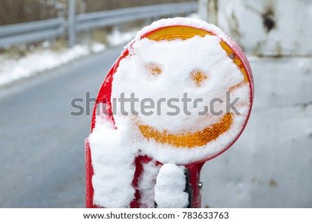 Snow-cover Smiling barrier sign