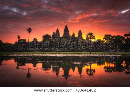 Beautiful sunrise with colorful sky at Angkor Wat (means "Temple City), a world heritage site, a temple complex in Siem Reap, Cambodia, the largest religious monument and the 7th wonder of the world.