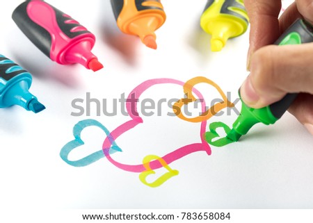 Multicolored felt tip pens on white background