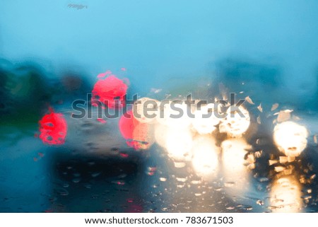 Driving In Rainy Day, Road View Through Car Window With Blur And Selective Focus