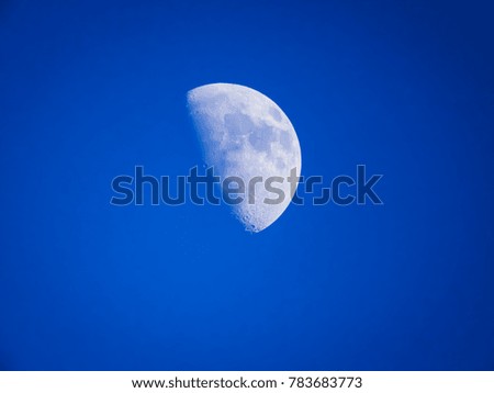 half moon in clear blue sky in Pakistan