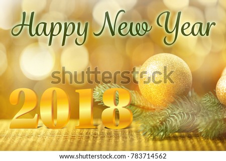 Message HAPPY NEW YEAR 2018 with fir tree branch and Christmas decor on blurred lights background