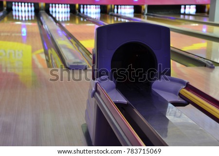  bowling alley lane with balls return machine