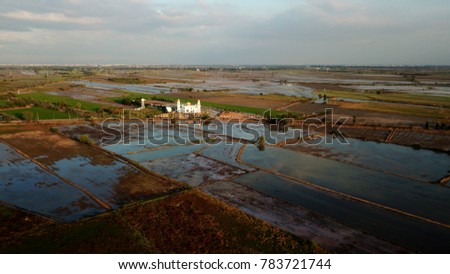 Drone aerial view Thailand countryside top tradition Mosque and village Thailand beautiful nature landscape background.