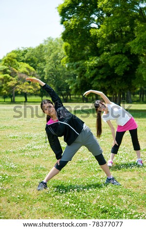 beautiful asian women exercising in the park