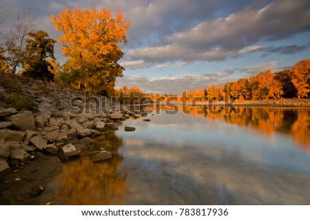 Autumn sunset on Bow river, Calgary, AB