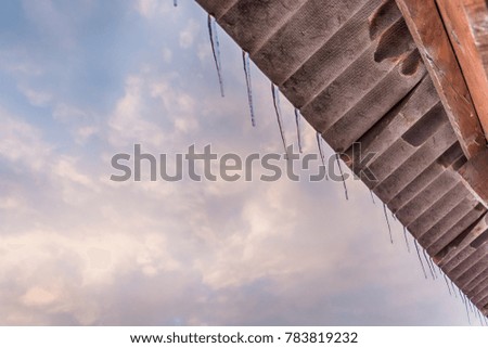 Wooden cottage and ice shelves from the roof