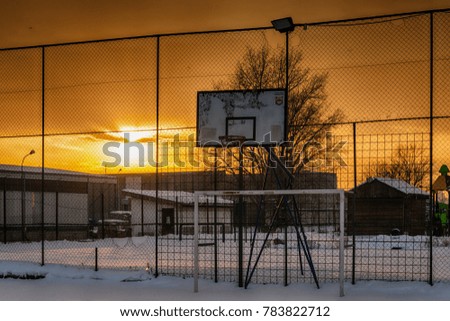 basketball court covered with snow