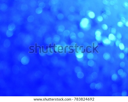 Decorative Abstract out of focus lights with abstract background of Blue color. Good for Diwali, Christmas and New Year celebrations. Abstract background of Blue and white color. 