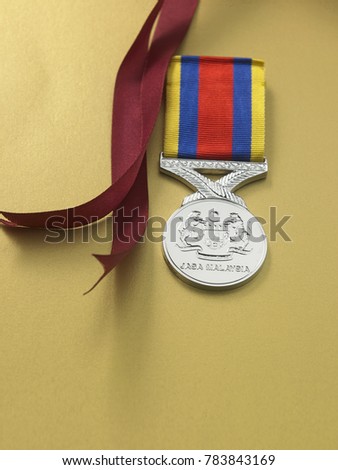 pjm medal given by the King and Government of Malaysia Malaysian Armed Forces also offered for award to members of the Commonwealth forces  Royalty-Free Stock Photo #783843169