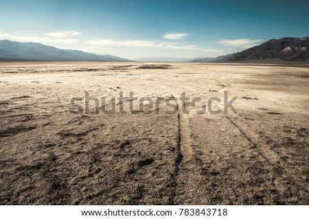 View of a salt desert from badwater basin, Death Valley National Park - California Royalty-Free Stock Photo #783843718