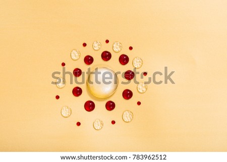  Water Drops Art on Gold Background with clear and red drops