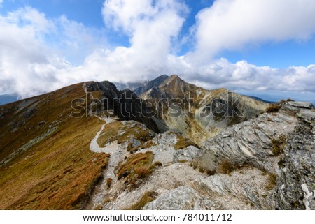 slovakian carpathian mountains in autumn. nice day for hiking. sharp rocky hill tops