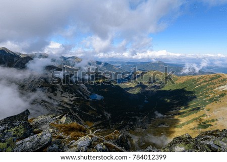 slovakian carpathian mountains in autumn. nice day for hiking. far horizon with soft clouds