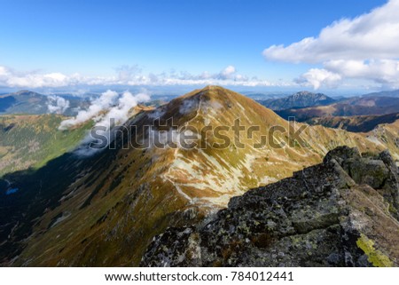 slovakian carpathian mountains in autumn. nice day for hiking. sharp rocky hill tops