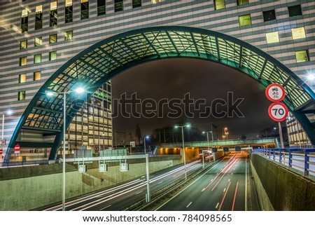 Speed traffic on motorway highway at night. The Netherlands 