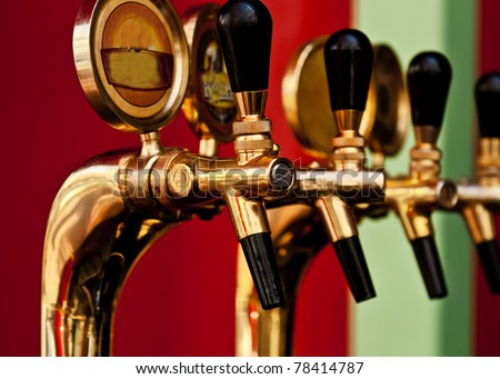 golden beer tap Royalty-Free Stock Photo #78414787