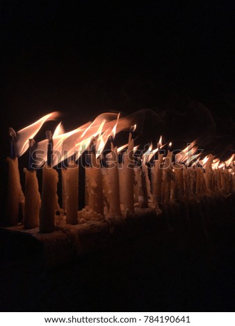 Burning Candles at Nighttime